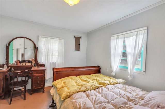 bedroom featuring carpet floors and ornamental molding