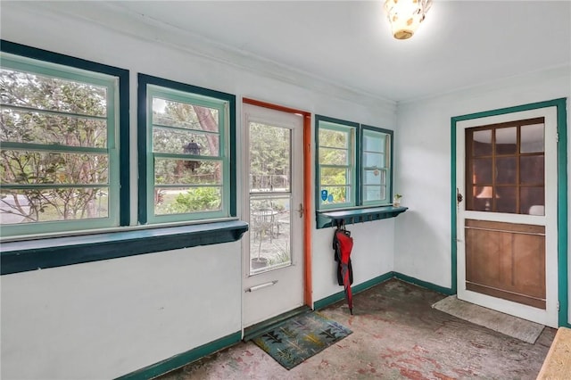 entryway with crown molding