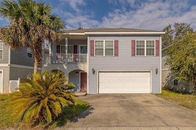 view of front of property featuring driveway and an attached garage