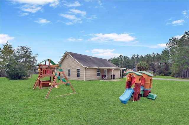 view of jungle gym featuring a yard