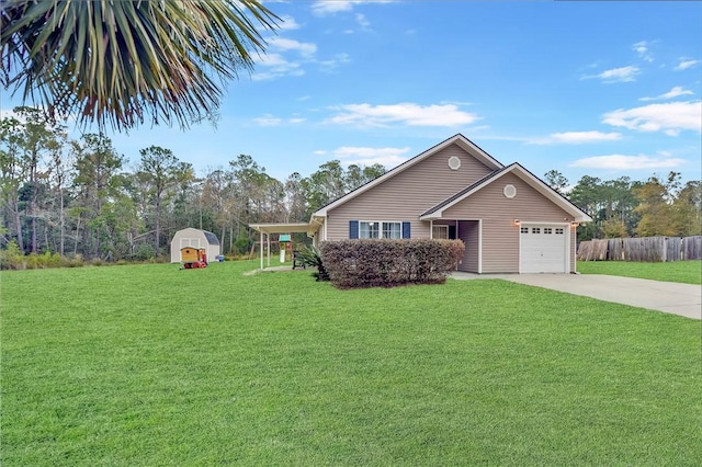 view of front of property featuring a garage and a front lawn