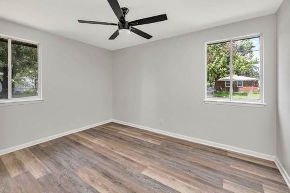 158 Yorktown Dr, Brunswick, GA 31525 - empty room featuring wood-type flooring and ceiling fan