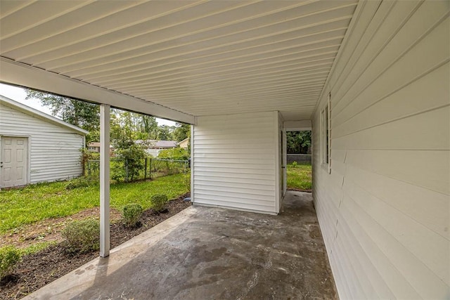 158 Yorktown Dr, Brunswick, GA 31525 - view of patio / terrace featuring a carport