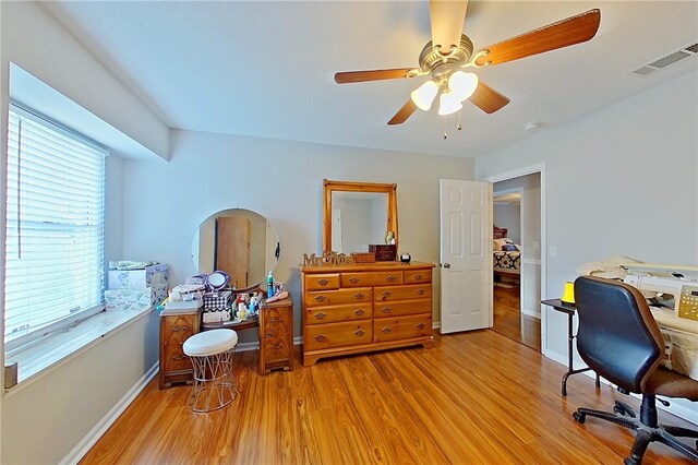1622 Booth St, Waycross, GA 31501 - office area featuring light wood finished floors, ceiling fan, and baseboards