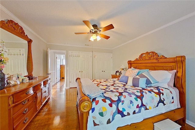 1622 Booth St, Waycross, GA 31501 - bedroom with wood finished floors, ornamental molding, ceiling fan, and baseboards