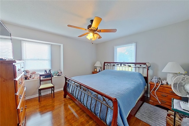 1622 Booth St, Waycross, GA 31501 - bedroom with wood finished floors, ceiling fan, and baseboards
