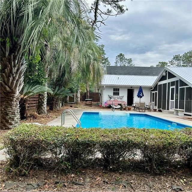 1622 Booth St, Waycross, GA 31501 - outdoor pool featuring a sunroom and a patio