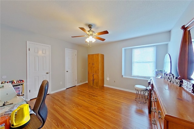 1622 Booth St, Waycross, GA 31501 - office area with ceiling fan, light wood-type flooring, and baseboards