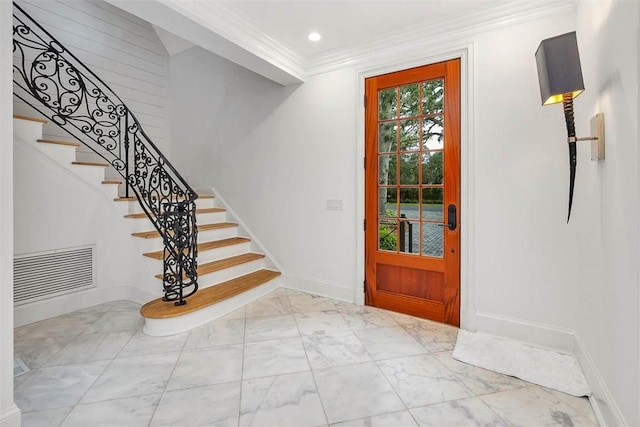 entrance foyer with ornamental molding