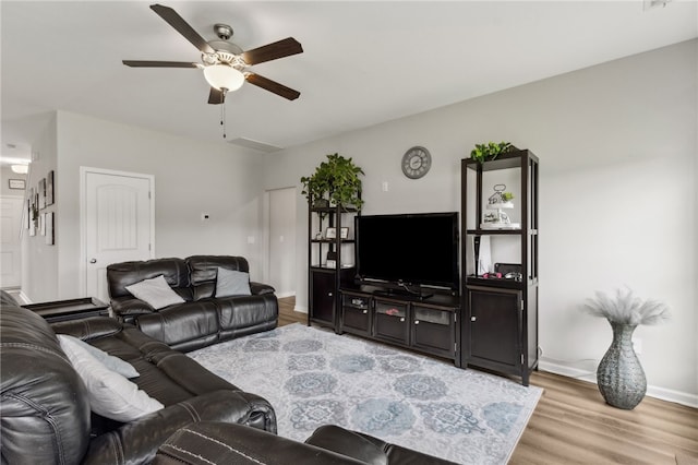 259 Daniel Trent Way, Kingsland, GA 31548 - living room with a ceiling fan and wood finished floors