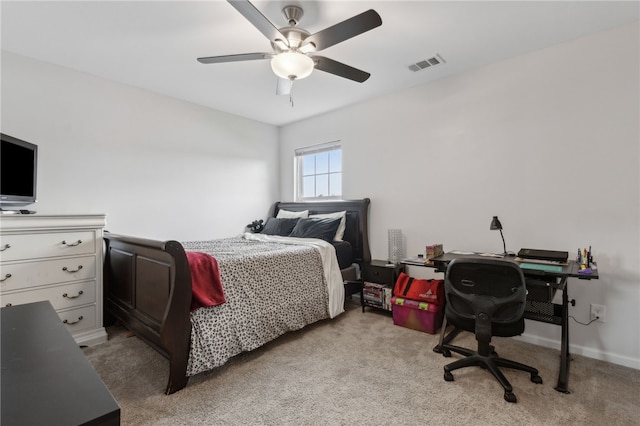 259 Daniel Trent Way, Kingsland, GA 31548 - bedroom with light carpet, a desk, and a ceiling fan