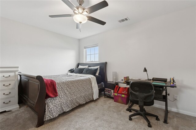259 Daniel Trent Way, Kingsland, GA 31548 - carpeted bedroom with a desk and ceiling fan