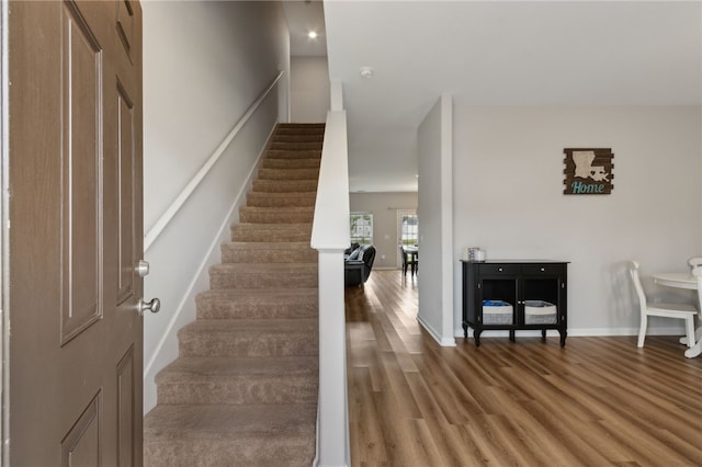 259 Daniel Trent Way, Kingsland, GA 31548 - stairway featuring wood finished floors and baseboards