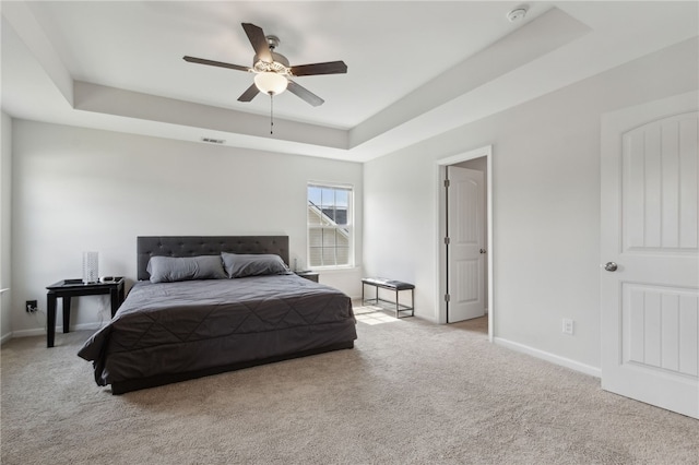 259 Daniel Trent Way, Kingsland, GA 31548 - carpeted bedroom featuring a raised ceiling and a ceiling fan