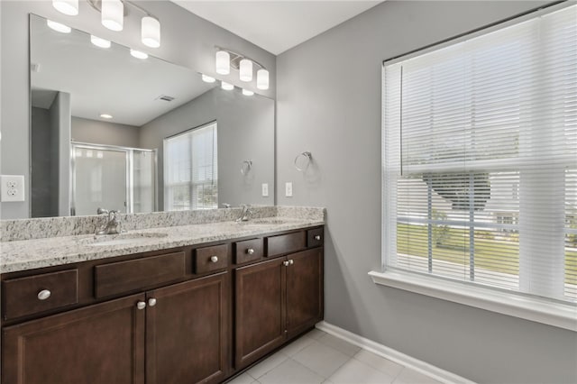 259 Daniel Trent Way, Kingsland, GA 31548 - full bath with double vanity, a stall shower, and tile patterned flooring