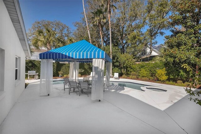 view of patio featuring outdoor dining area