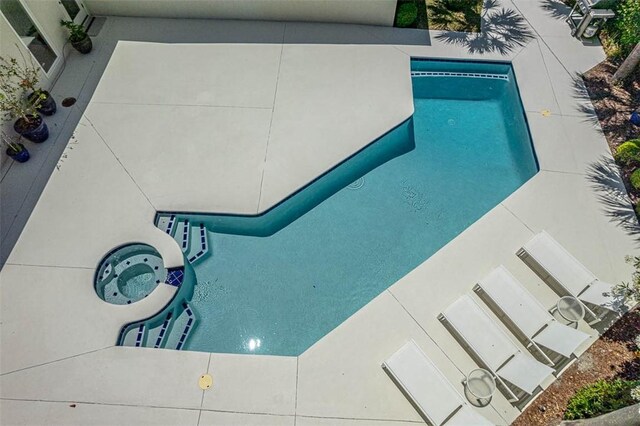 4218 Fifth St, Saint Simons Island, GA 31522 - view of pool with a pool with connected hot tub