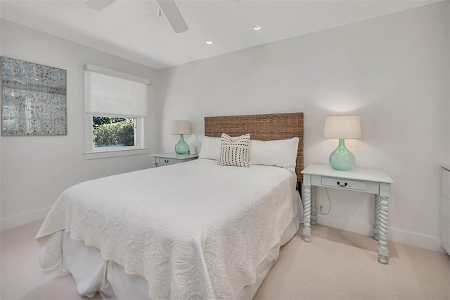 carpeted bedroom featuring recessed lighting, ceiling fan, and baseboards