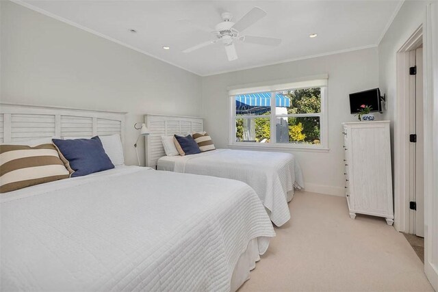 bedroom with ceiling fan, recessed lighting, light carpet, baseboards, and ornamental molding