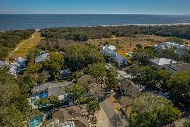 birds eye view of property featuring a residential view and a water view