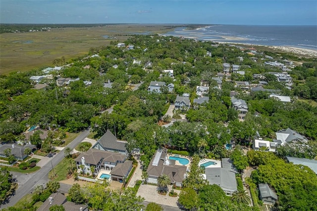 4218 Fifth St, Saint Simons Island, GA 31522 - aerial view of property's location featuring a nearby body of water, a pool, and nearby suburban area