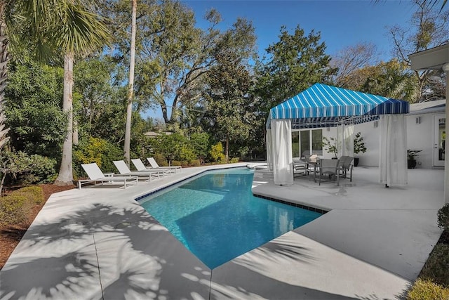 pool featuring a patio