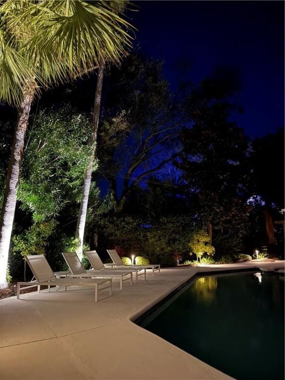 outdoor pool featuring a patio