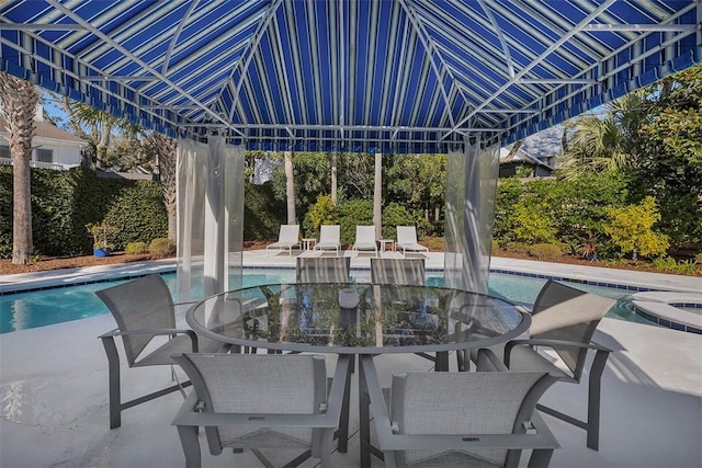 view of patio featuring a fenced in pool