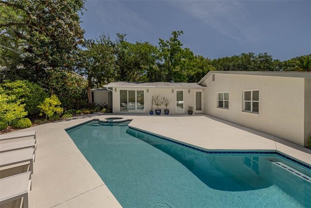 4218 Fifth St, Saint Simons Island, GA 31522 - view of swimming pool with a patio area and a pool with connected hot tub