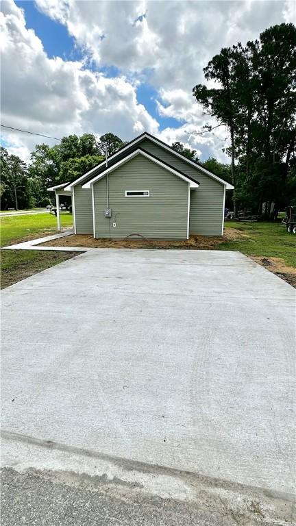 garage with a yard