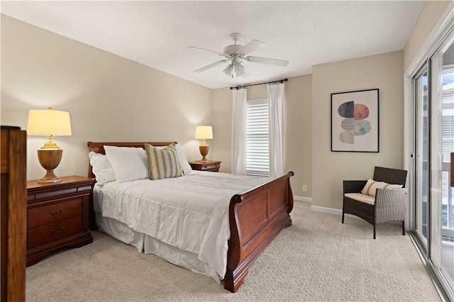 bedroom with ceiling fan, light colored carpet, and access to exterior