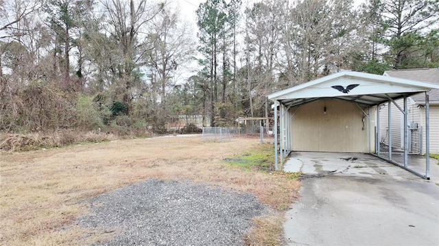 view of yard featuring a carport