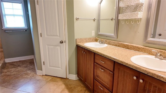 bathroom with vanity and tile patterned floors