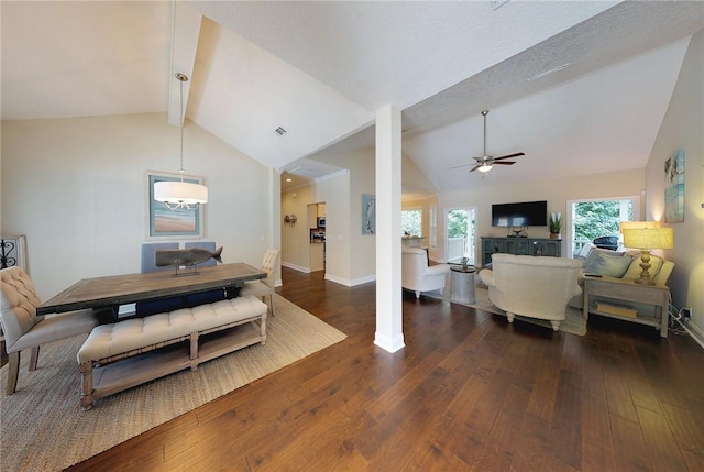 dining room featuring dark hardwood / wood-style flooring, lofted ceiling with beams, and ceiling fan