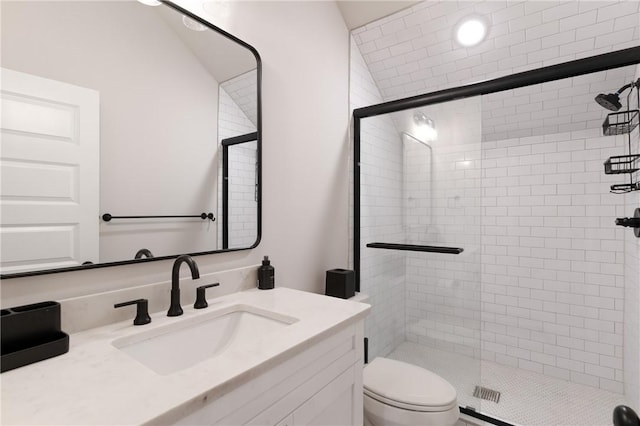 166 Robertson Cir, Saint Simons Island, GA 31522 - bathroom featuring a shower stall, vanity, and toilet
