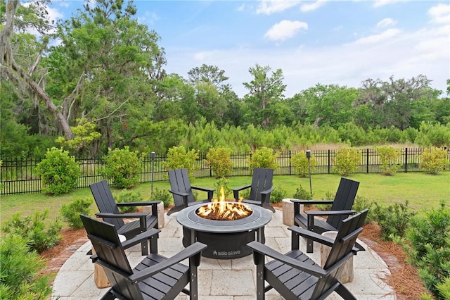 166 Robertson Cir, Saint Simons Island, GA 31522 - view of patio featuring a fire pit