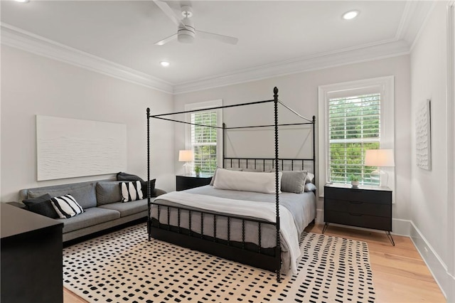 166 Robertson Cir, Saint Simons Island, GA 31522 - bedroom featuring wood finished floors, ornamental molding, baseboards, ceiling fan, and recessed lighting