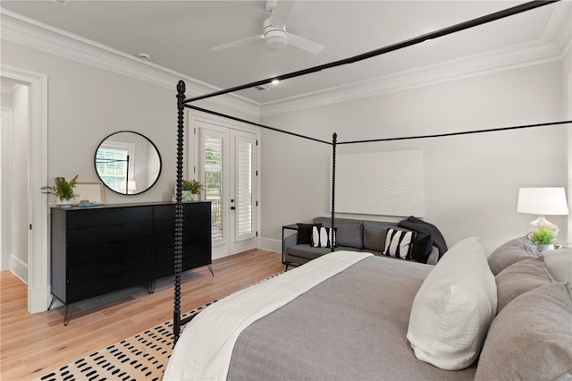 166 Robertson Cir, Saint Simons Island, GA 31522 - bedroom with crown molding, light wood-style floors, access to exterior, baseboards, and a ceiling fan