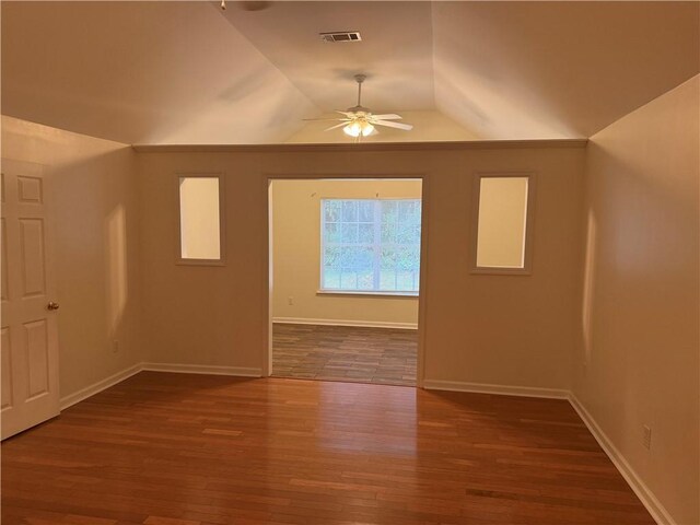 208 Stafford Ave, Brunswick, GA 31520 - spare room with a ceiling fan, lofted ceiling, and wood finished floors