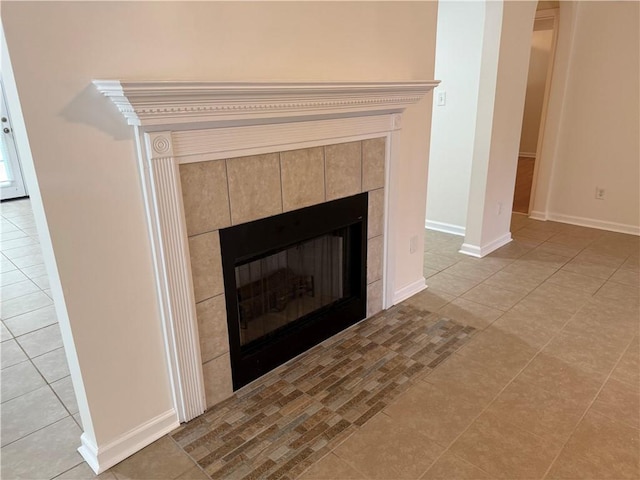 208 Stafford Ave, Brunswick, GA 31520 - detailed view of a tiled fireplace and baseboards