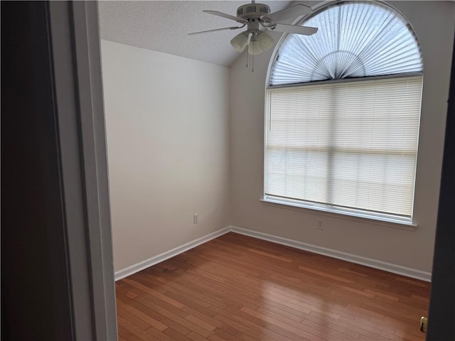 208 Stafford Ave, Brunswick, GA 31520 - spare room featuring ceiling fan, hardwood / wood-style flooring, and lofted ceiling