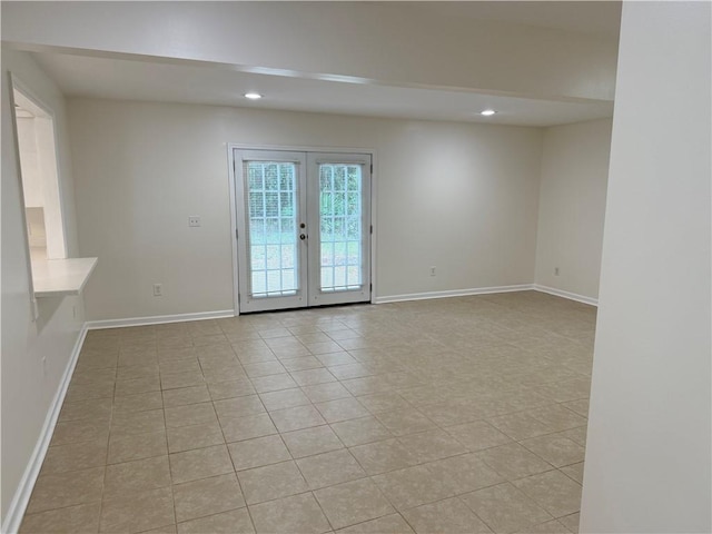 208 Stafford Ave, Brunswick, GA 31520 - empty room featuring french doors, recessed lighting, and light tile patterned flooring