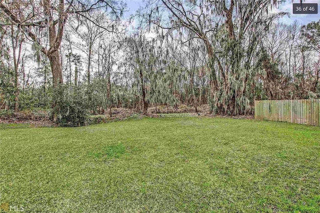 view of yard featuring fence