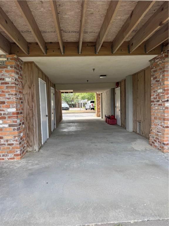 91 Screven St Unit 105, Darien, GA 31305 - view of patio / terrace with a carport