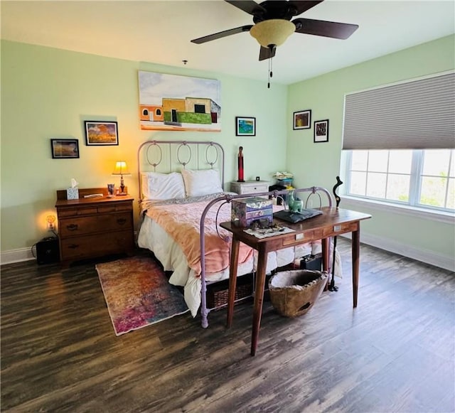 91 Screven St Unit 105, Darien, GA 31305 - bedroom featuring wood finished floors, baseboards, and a ceiling fan