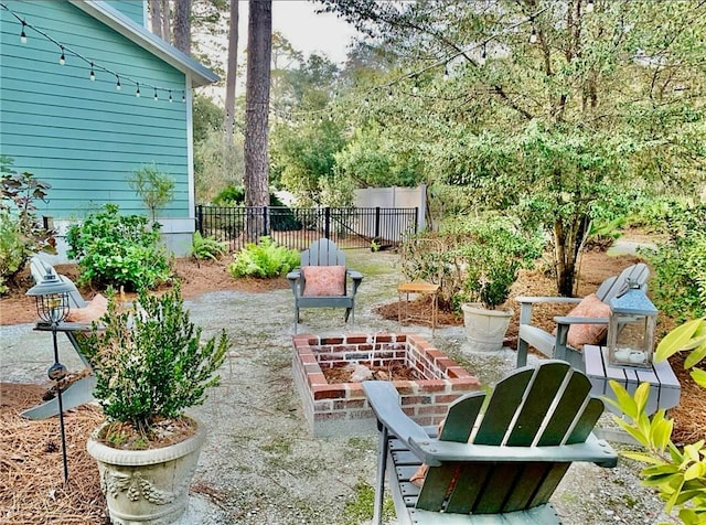 view of patio with a fire pit