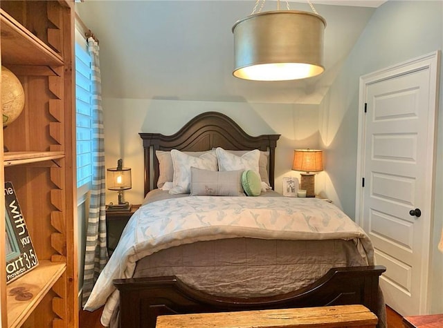 bedroom featuring multiple windows