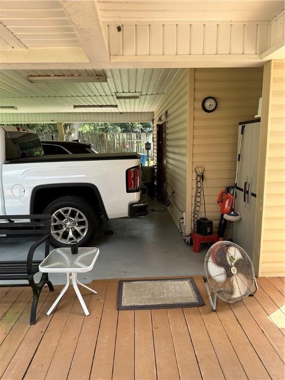 garage with a carport