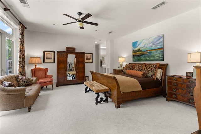 carpeted bedroom with ceiling fan