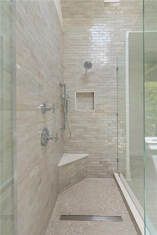 bathroom featuring a stall shower
